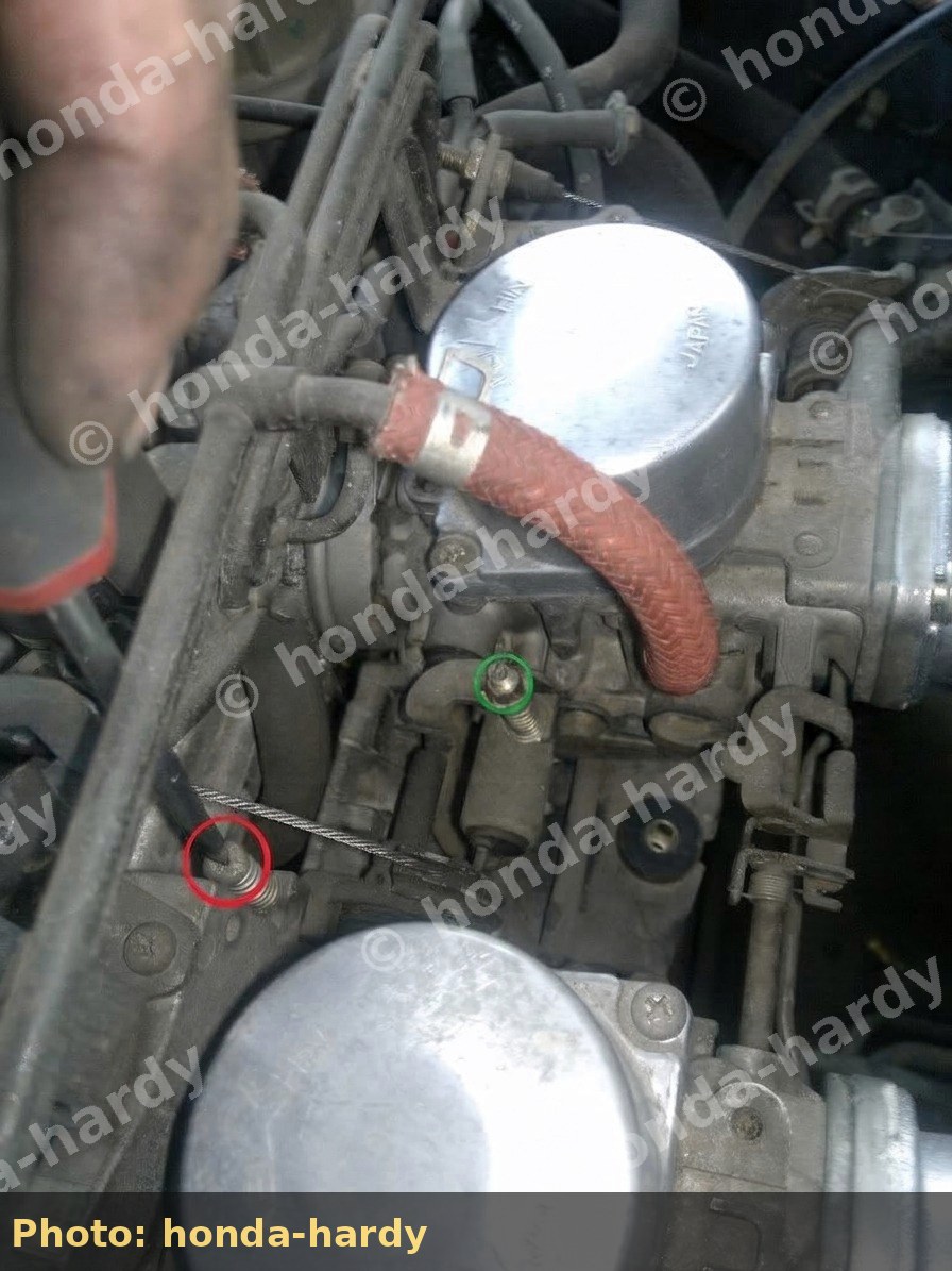 Idle speed screw on dual-carb linkage