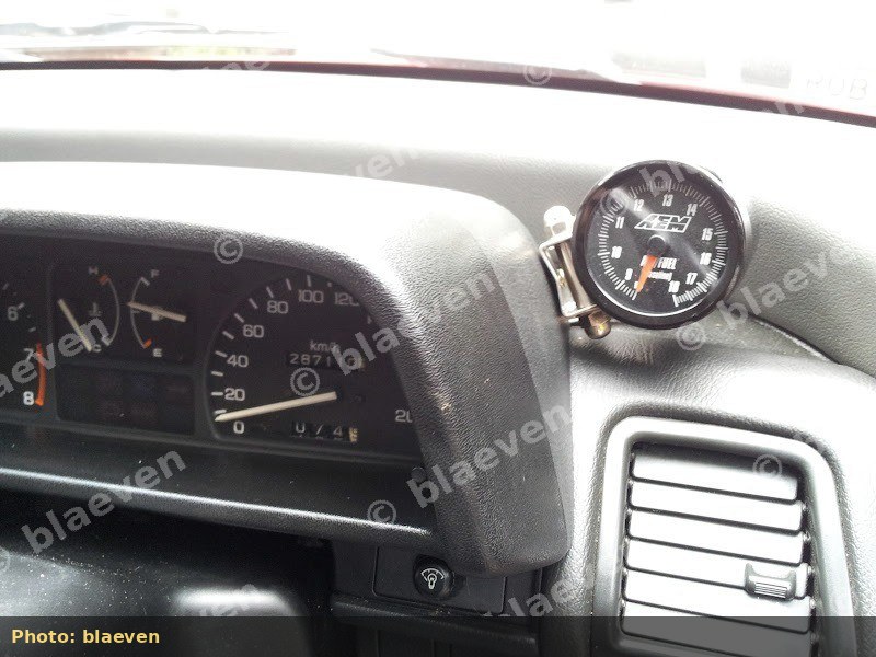 AEM wideband AFR gauge on dual-carb dash
