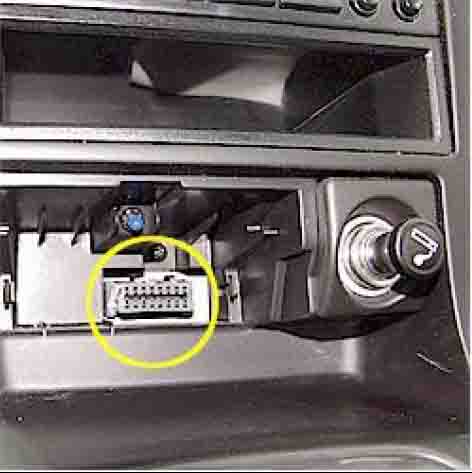 Behind the Center Console Ashtray